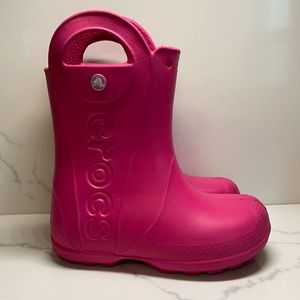 Pink Crocs rain boots